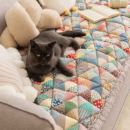 GardenGuard – Stylish Sofa Protector with Quilted Design & Non-Slip Backing