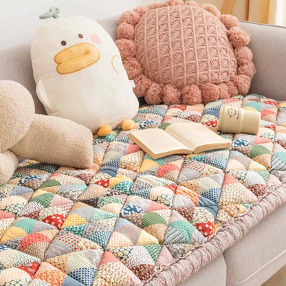 GardenGuard – Stylish Sofa Protector with Quilted Design & Non-Slip Backing